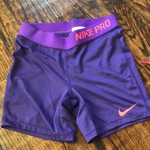 purple and neon pink nike spandex